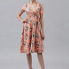 peach coloured floral crepe maternity dress